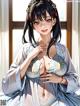 A woman in a blue and white kimono sitting on a bed.